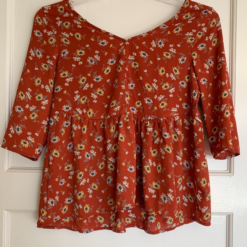 Floral Orange 3/4 sleeve Peplum Top Les Amis